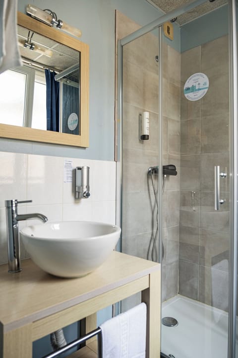 Shower, free toiletries, hair dryer, towels