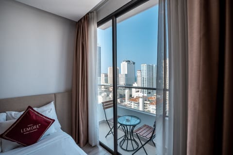 Premier Triple Room, 1 Bedroom, Sea View | 1 bedroom, minibar, in-room safe, desk