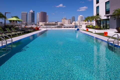 Outdoor pool, pool umbrellas, sun loungers