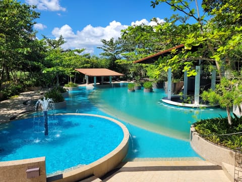 Outdoor pool, sun loungers, lifeguards on site