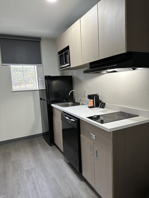 Room, 1 King Bed, Non Smoking (Efficiency) | Private kitchen | Full-size fridge, microwave, stovetop, coffee/tea maker