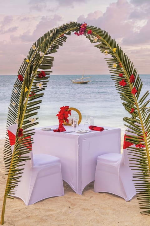 Private beach, white sand, sun loungers, beach umbrellas