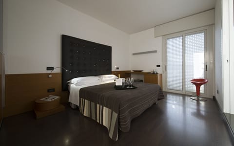 Junior Suite, Balcony | Minibar, in-room safe, desk, free WiFi