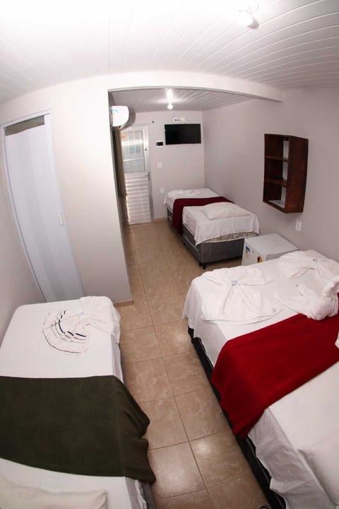 Standard Quadruple Room, Non Smoking | Minibar, blackout drapes, free WiFi, bed sheets