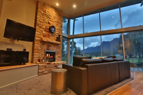 Luxury Chalet, 1 King Bed, Mountain View | Living area | Flat-screen TV, DVD player