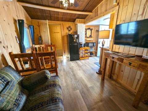 Standard Cabin #1 | Living area | Flat-screen TV