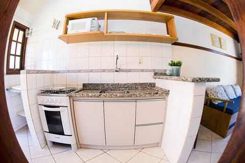 Apartment, Sea View, Mezzanine | Private kitchen | Full-size fridge, microwave, electric kettle, cookware/dishes/utensils