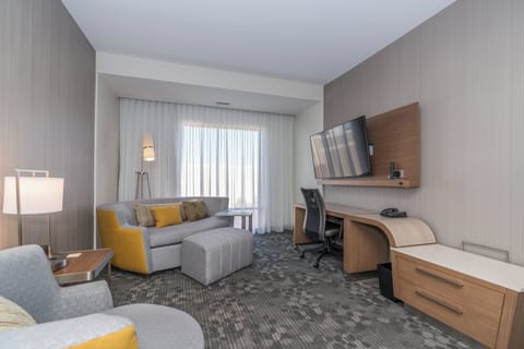 Suite, 1 King Bed with Sofa bed | Living area | 55-inch LED TV with satellite channels, TV, Netflix