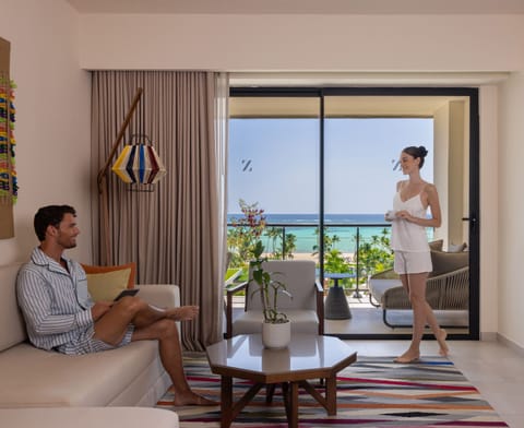 Club Ocean View One Bedroom Grand Master Suite | Living area | Flat-screen TV, iPod dock