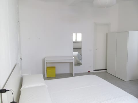 Triple Room | Desk, blackout drapes, iron/ironing board, free WiFi