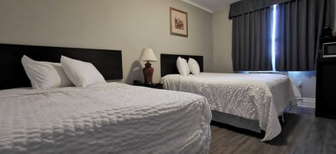 Room, 2 Queen Beds, Non Smoking | Premium bedding, pillowtop beds, individually furnished, desk