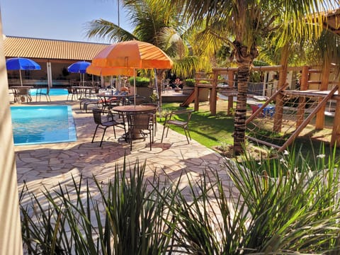 2 outdoor pools, open 8:00 AM to 10:00 AM, pool umbrellas, sun loungers