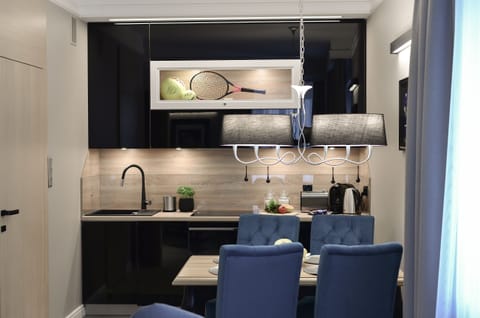 Deluxe Apartment (Dubai) | Private kitchenette | Fridge, microwave, stovetop, dishwasher