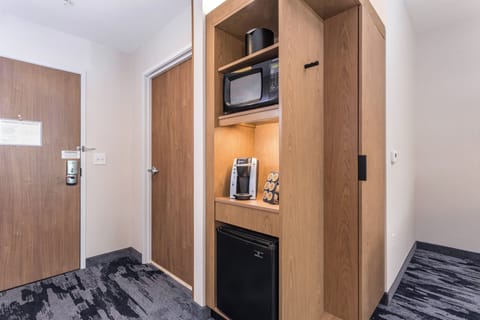 Desk, blackout drapes, iron/ironing board, free cribs/infant beds