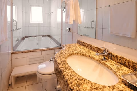 Suite, Jetted Tub | Bathroom | Shower, free toiletries, towels