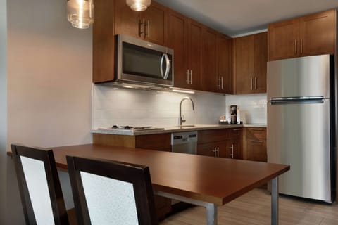 Suite, 1 Bedroom, Non Smoking | Private kitchen | Full-size fridge, microwave, stovetop, dishwasher