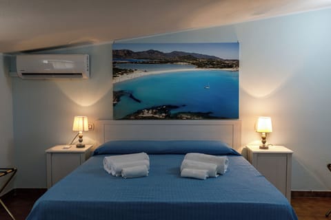 Deluxe Room (Bagno esterno / External Bathroom) | Water view