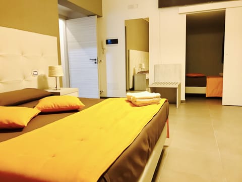 Triple Room | Minibar, desk, rollaway beds, free WiFi