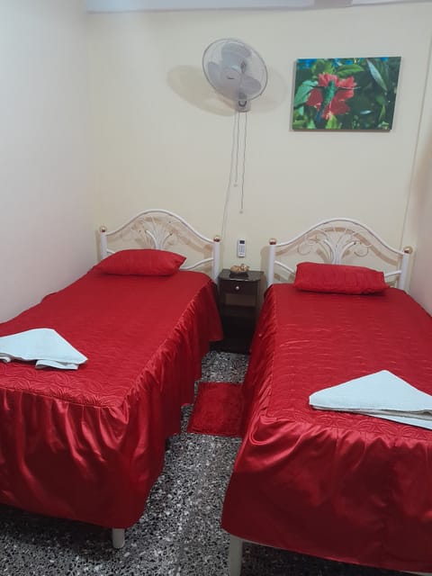 Economy Room, 2 Twin Beds | 3 bedrooms, pillowtop beds, minibar, free WiFi