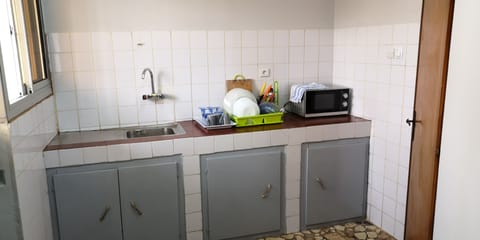 Apartment, Non Smoking | Private kitchen | Full-size fridge, microwave, oven, stovetop