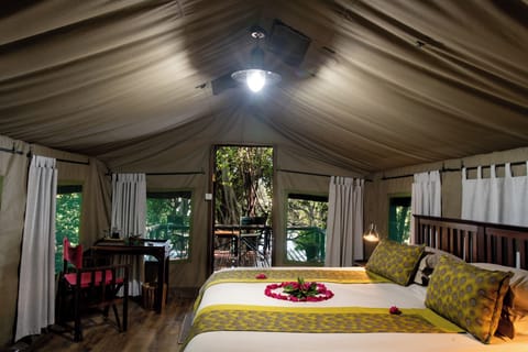 Luxury Tent, 1 Large Twin Bed, Non Smoking, River View | In-room safe, desk, bed sheets