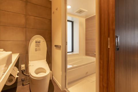 Corner Double Room, Non Smoking | Bathroom | Eco-friendly toiletries, hair dryer, slippers, electronic bidet