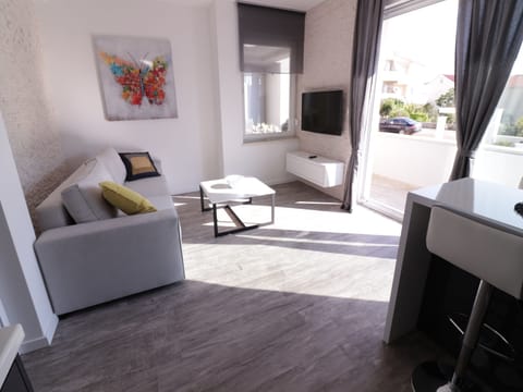 Superior Apartment, 2 Bedrooms, Terrace (B2) | Living room | Flat-screen TV