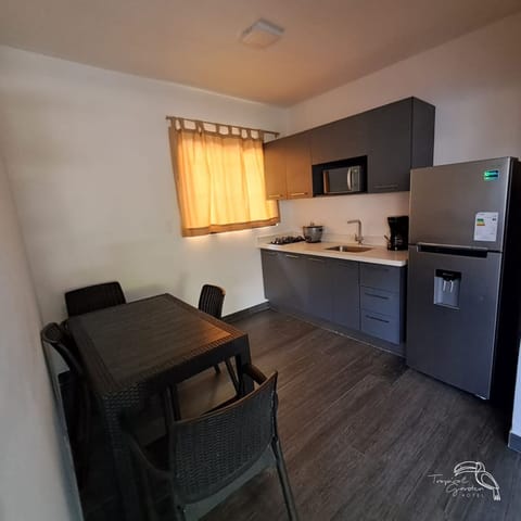 Family Apartment, Multiple Beds, Non Smoking, Pool View | Private kitchen | Full-size fridge, microwave, coffee/tea maker, cookware/dishes/utensils