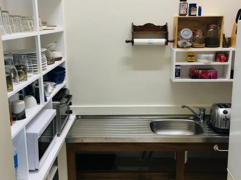 Shared fridge, microwave, coffee/tea maker, electric kettle