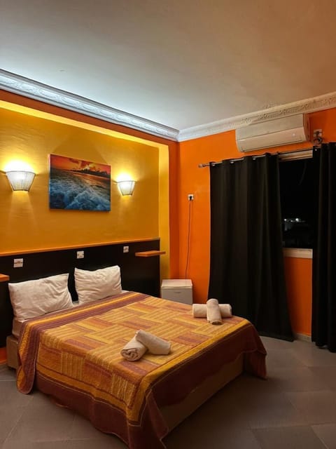 Basic Double or Twin Room, Smoking, Partial Sea View | Minibar, desk, iron/ironing board, rollaway beds