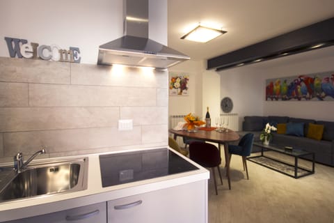 Design Apartment, 1 Bedroom | Private kitchenette | Full-size fridge, microwave, stovetop, dishwasher