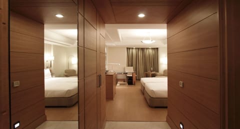 Business Room | Premium bedding, minibar, in-room safe, individually decorated