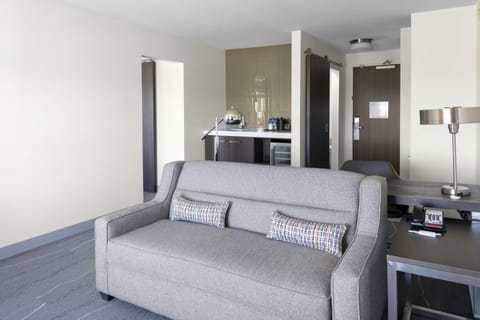 Suite, 1 Bedroom, Mountain View | Living area | 55-inch flat-screen TV with cable channels, TV, MP3 dock