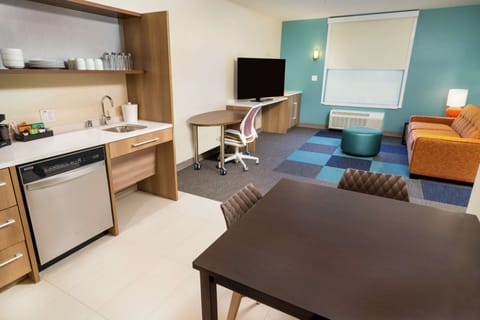 Desk, blackout drapes, iron/ironing board, free cribs/infant beds