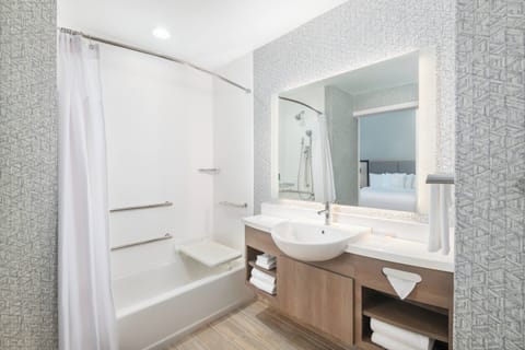 Suite, 2 Queen Beds with Sofa Bed, Inland View | Bathroom | Hydromassage showerhead, free toiletries, hair dryer, towels