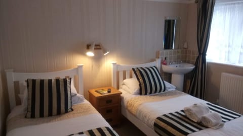 Twin Room, Shared Bathroom (Room 3) | Iron/ironing board, free WiFi, bed sheets