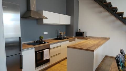 Apartment, 1 King Bed, Non Smoking, Sea View | Private kitchen | Full-size fridge, stovetop, espresso maker, coffee/tea maker