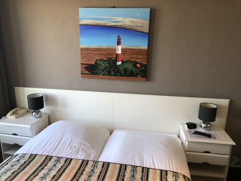 Basic Double or Twin Room, Ocean View | In-room safe, blackout drapes, iron/ironing board, free WiFi