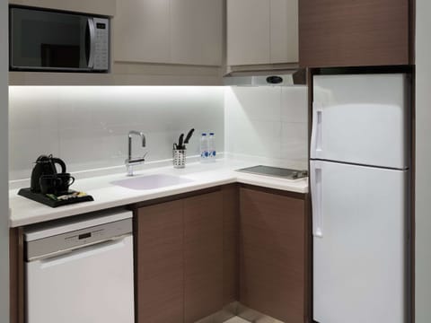 Studio, 1 Double Bed | Private kitchen | Fridge, microwave, stovetop, dishwasher