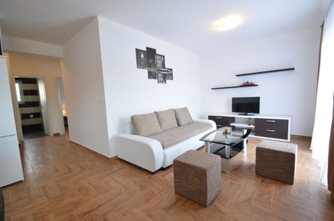 Apartment, 2 Bedrooms | Living area | Flat-screen TV