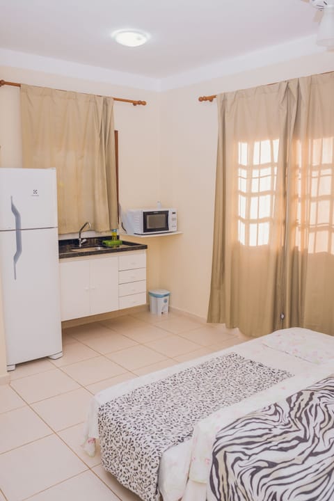 Standard Quadruple Room, Multiple Beds, Non Smoking, Garden View | Private kitchenette | Microwave, coffee/tea maker, cookware/dishes/utensils