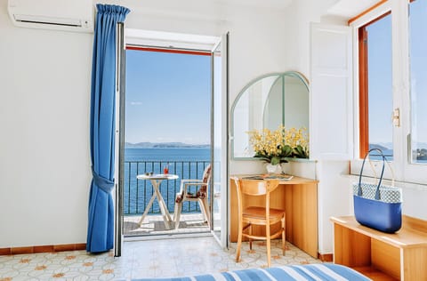 Comfort Double or Twin Room, Sea View | Minibar, desk, free WiFi, bed sheets