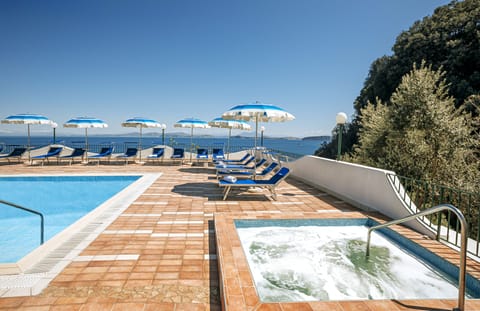 Outdoor pool, pool umbrellas, sun loungers