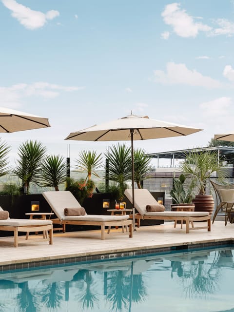 Outdoor pool, open 8:00 AM to 10:00 PM, cabanas (surcharge)