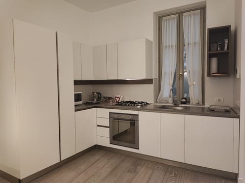 Comfort Suite, 1 Bedroom | Private kitchen | Fridge, coffee/tea maker, electric kettle