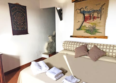 Deluxe Double Room, Pool Access, Garden View (004) | Free minibar, in-room safe, individually decorated, desk
