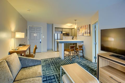 Suite, 1 Bedroom | Living area | 37-inch flat-screen TV with cable channels, TV