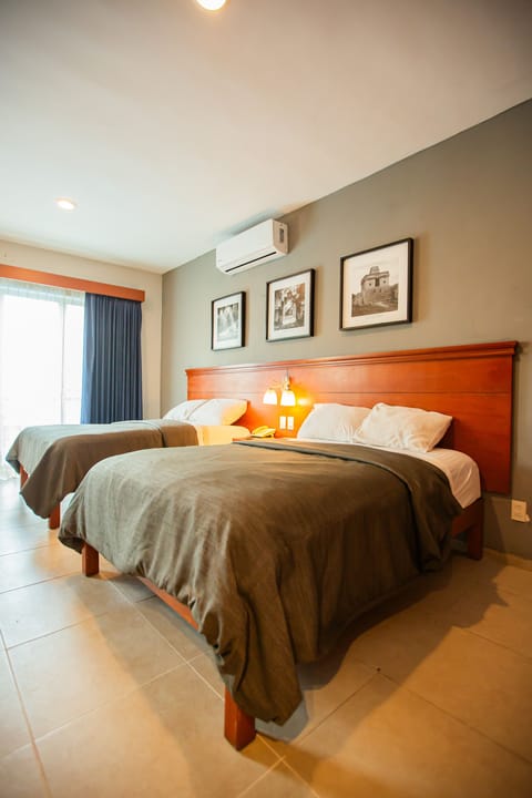 Executive Room, 2 Double Beds | In-room safe, free WiFi, bed sheets