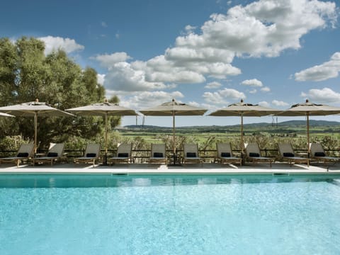 Indoor pool, pool umbrellas, sun loungers