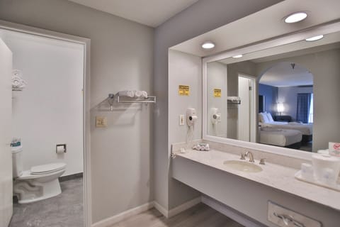 Standard Room, 2 Queen Beds, Non Smoking, Refrigerator | Bathroom | Combined shower/tub, free toiletries, hair dryer, towels